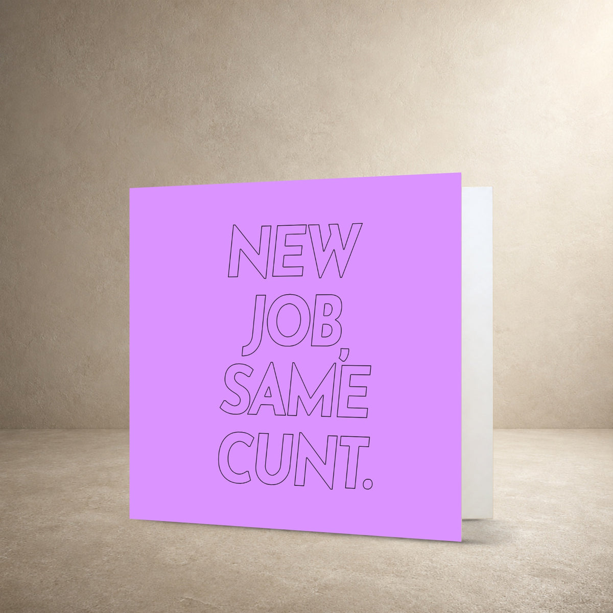 Lilac card front with large black outlined typography, with the message: “New job, same cunt.”.