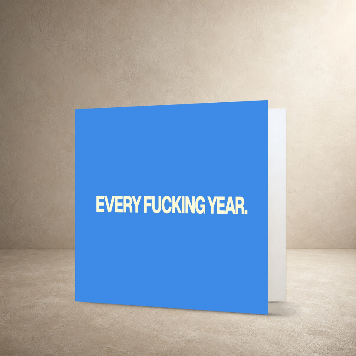 Light blue card front with bold cream centred typography, with the message: “Every fucking year.”.