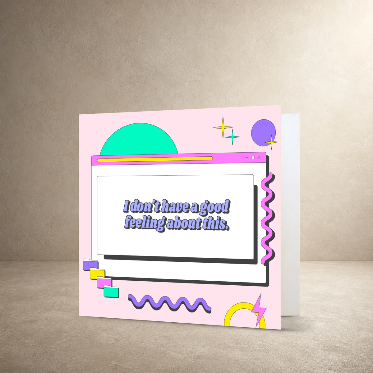 Pastel pink card front with a retro computer window, geometric shapes and squiggly graphics, with the message: “I don't have a good feeling about this.”.