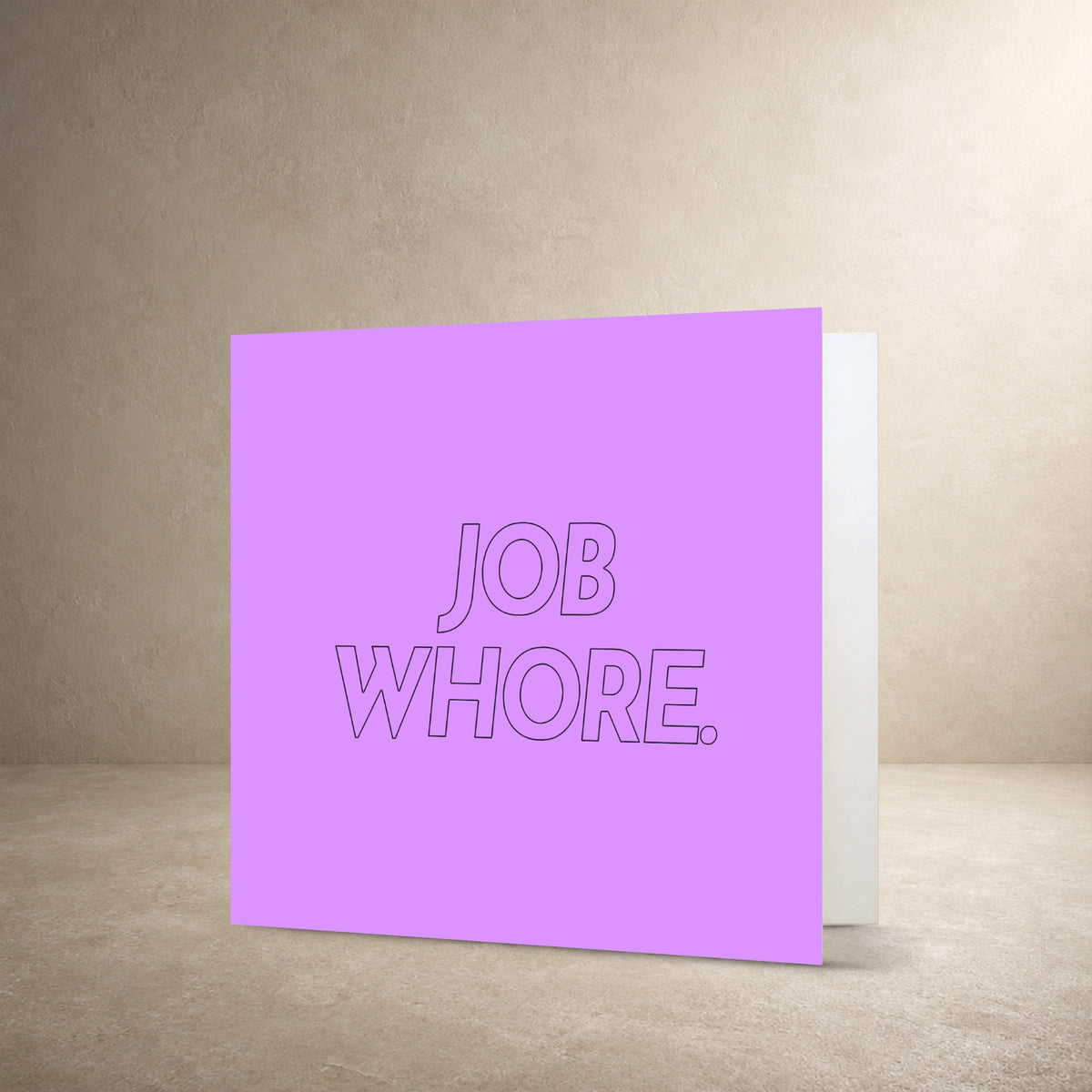 Lilac card front with large black outlined typography, with the message: “Job whore.”.
