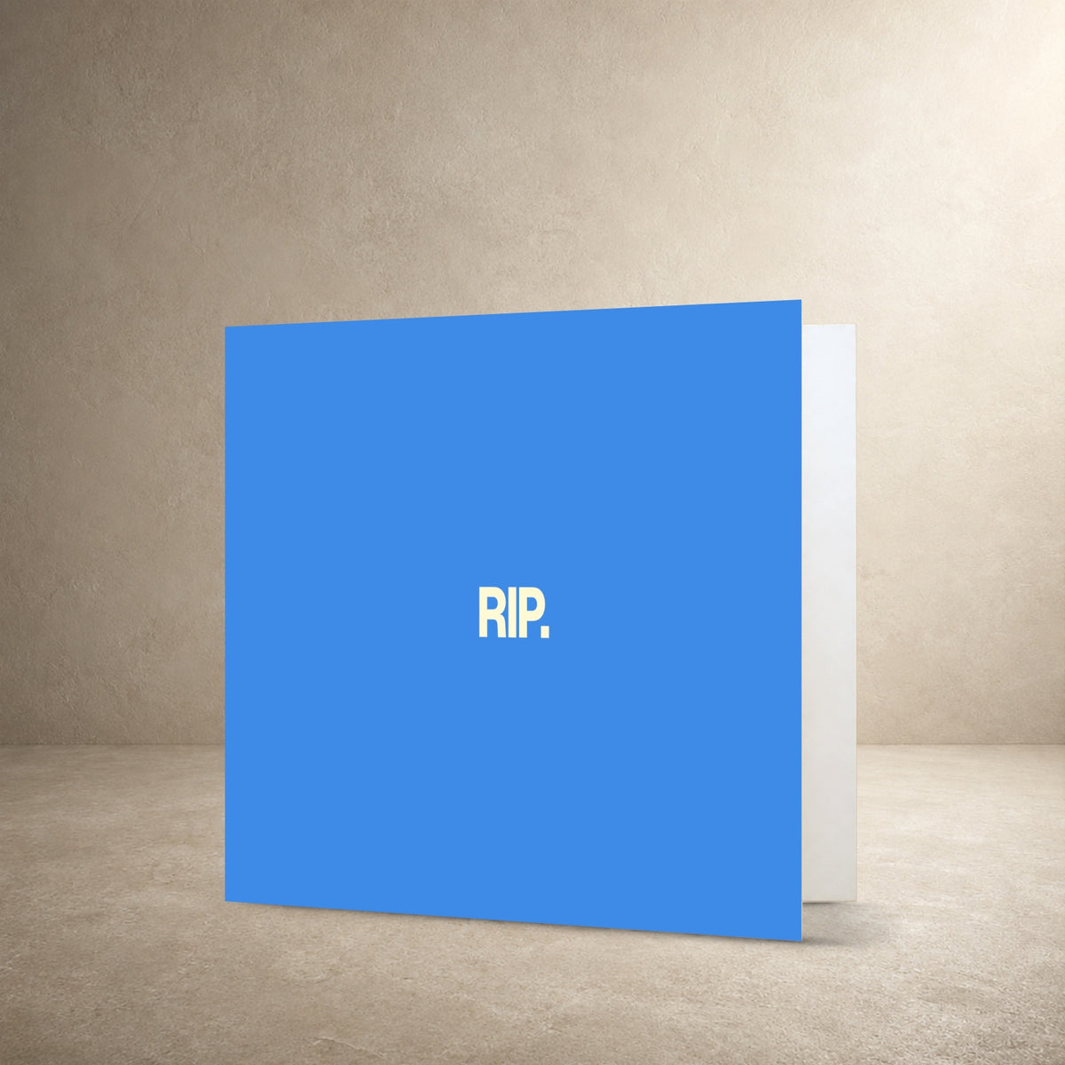 Light blue card front with bold cream centred typography, with the message: “RIP.”.