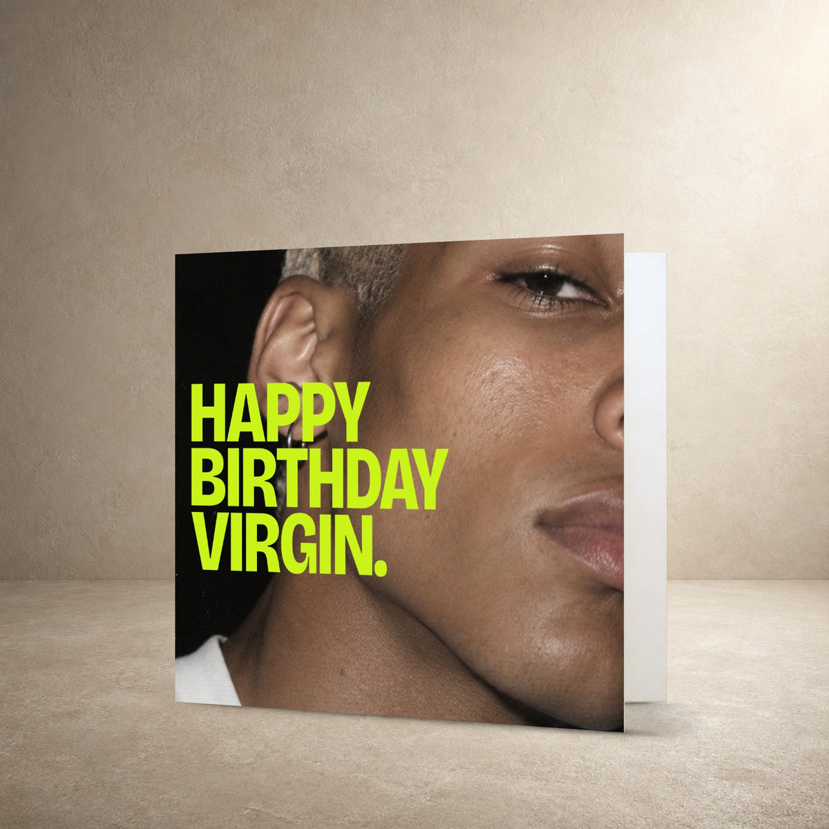 Close-up portrait photograph card front with lime green typography, with the message: “Happy birthday Virgin.”.